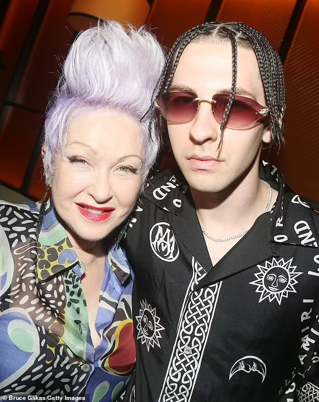 Cyndi Lauper's son arrested on gun possession charge after man found shot in the leg in NYC